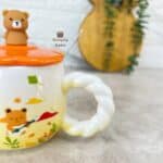 لیوان سرامیکی نازنجی قاشق دار